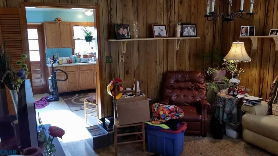 385 Fredericks Hall Road Bumpass, VA 23024 - Photo 10 of 27 a room filled with furniture and toys