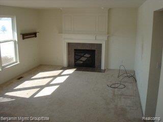 855 Deer Run Lake Road Holly, MI 48442 - Photo 5 of 5 Living Room with fireplace