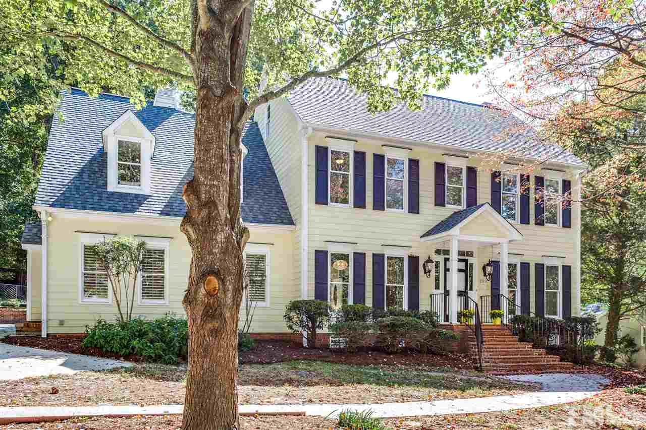 2915 Buckingham Road Durham, NC 27707 - Photo 1 of 25 a front view of a house with garden