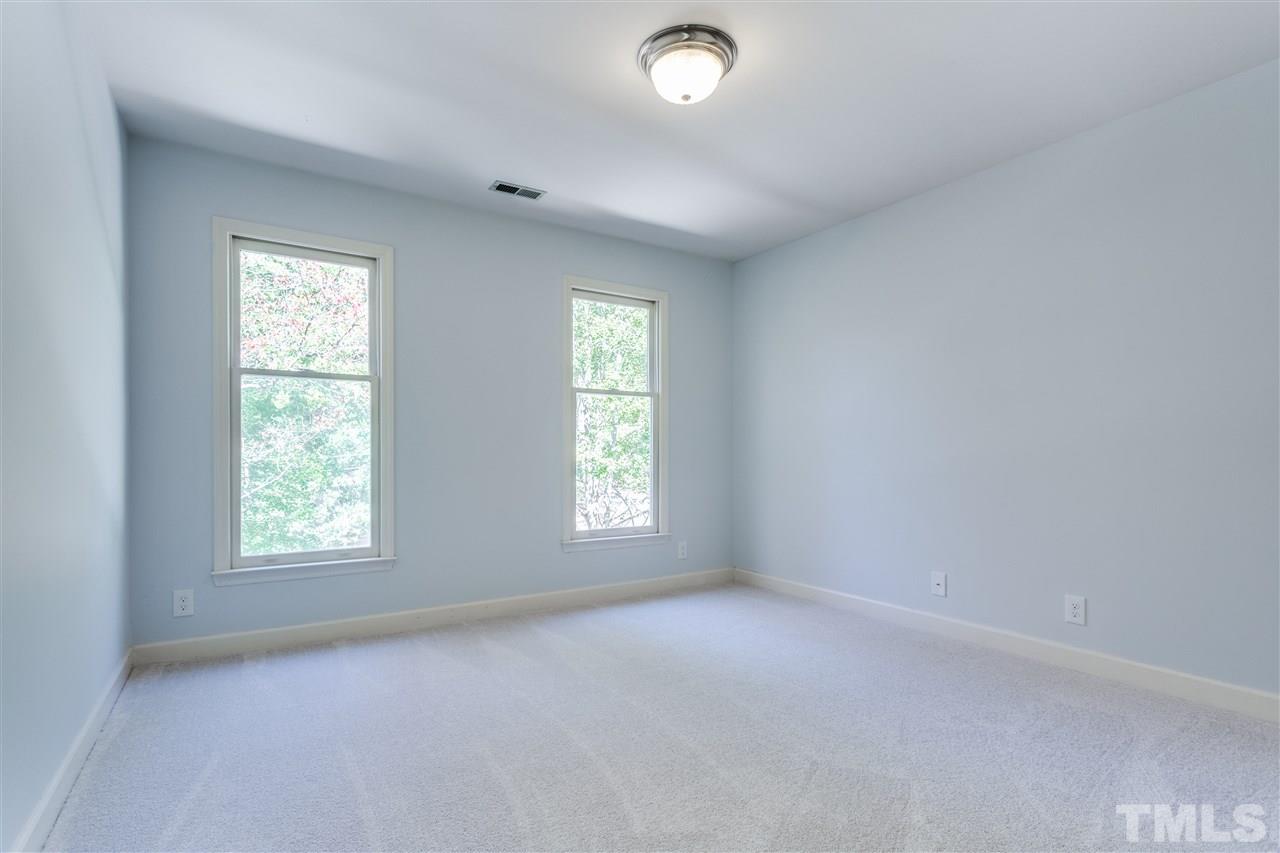 2915 Buckingham Road Durham, NC 27707 - Photo 20 of 25 an empty room with windows