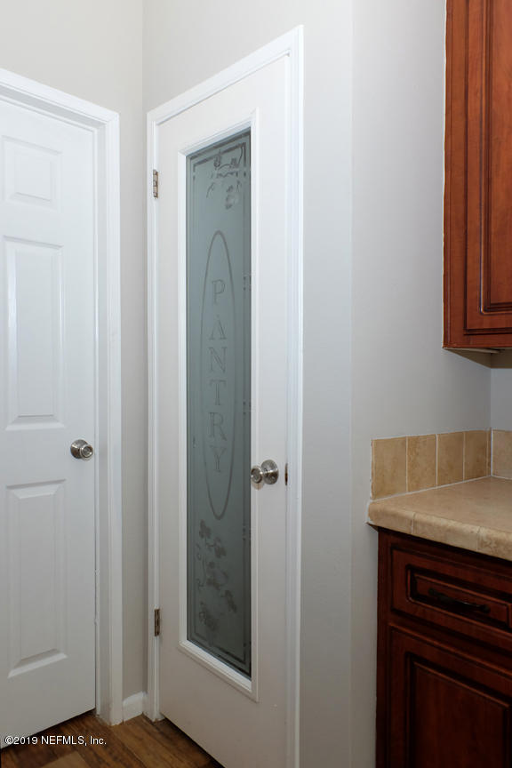 2546 Rabbit Court Middleburg, FL 32068 - Photo 16 of 42 Glass Pantry Door