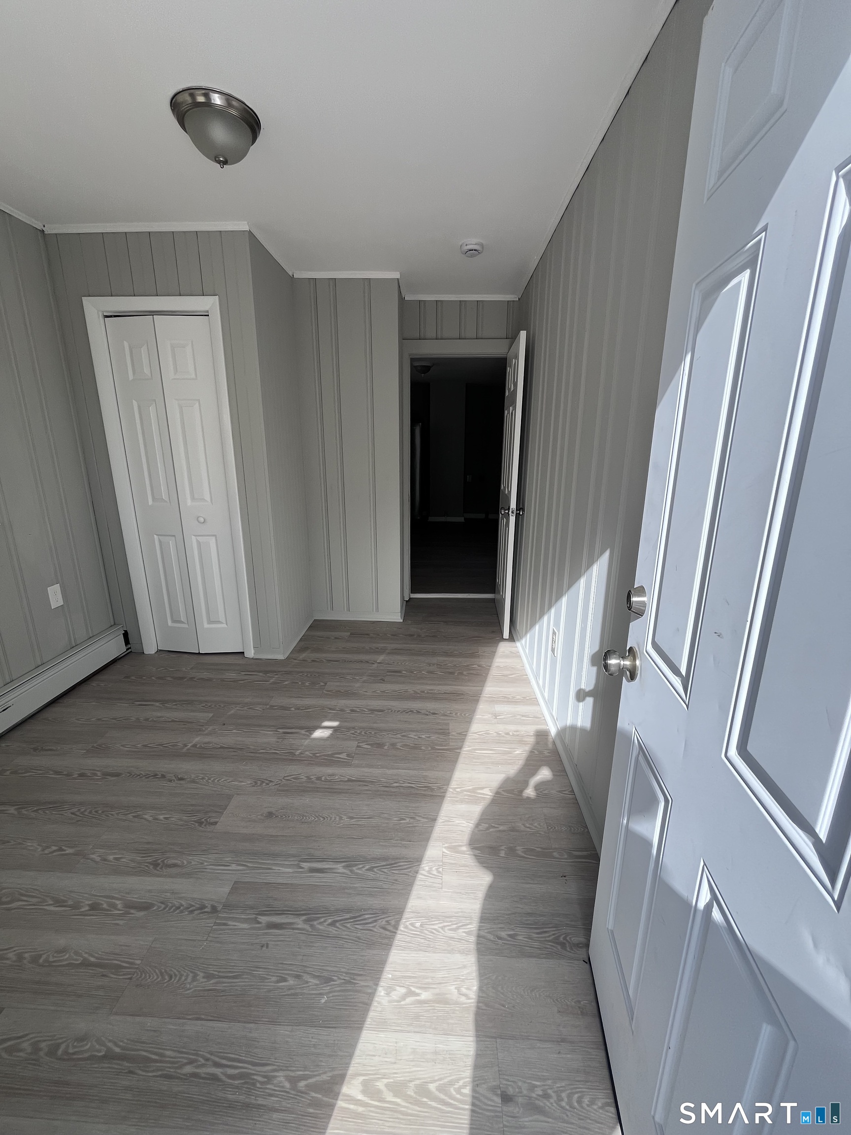 144 Clark Street New Britain, CT 06051 - Photo 2 of 14 a view of entryway with wooden floor
