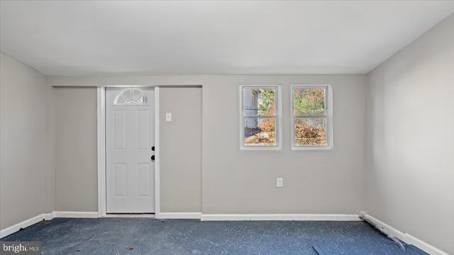 an empty room with closet
