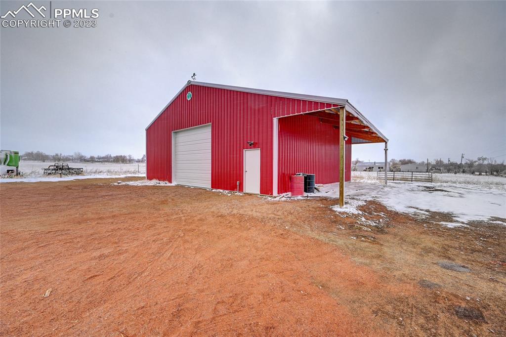 237 9th Street Penrose, CO 81240 - Photo 24 of 24 a view of a house with a yard