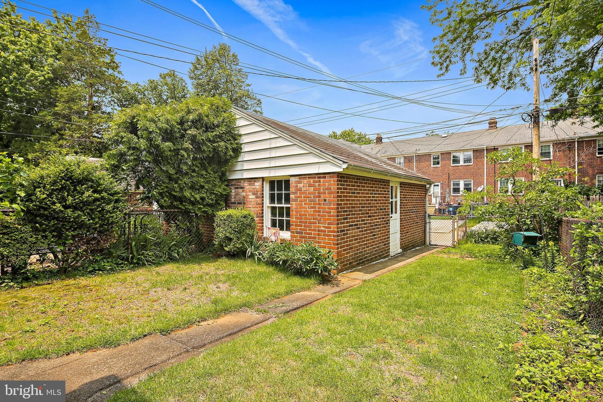 48 Dunkirk Road Baltimore, MD 21212 - Photo 31 of 34 a view of a house with backyard and garden