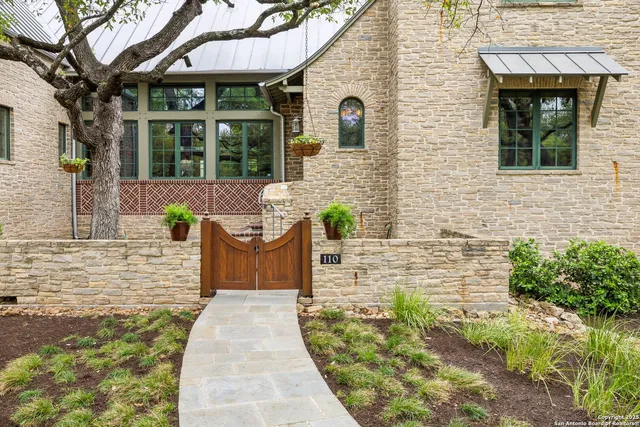a view of a brick house with a large windows