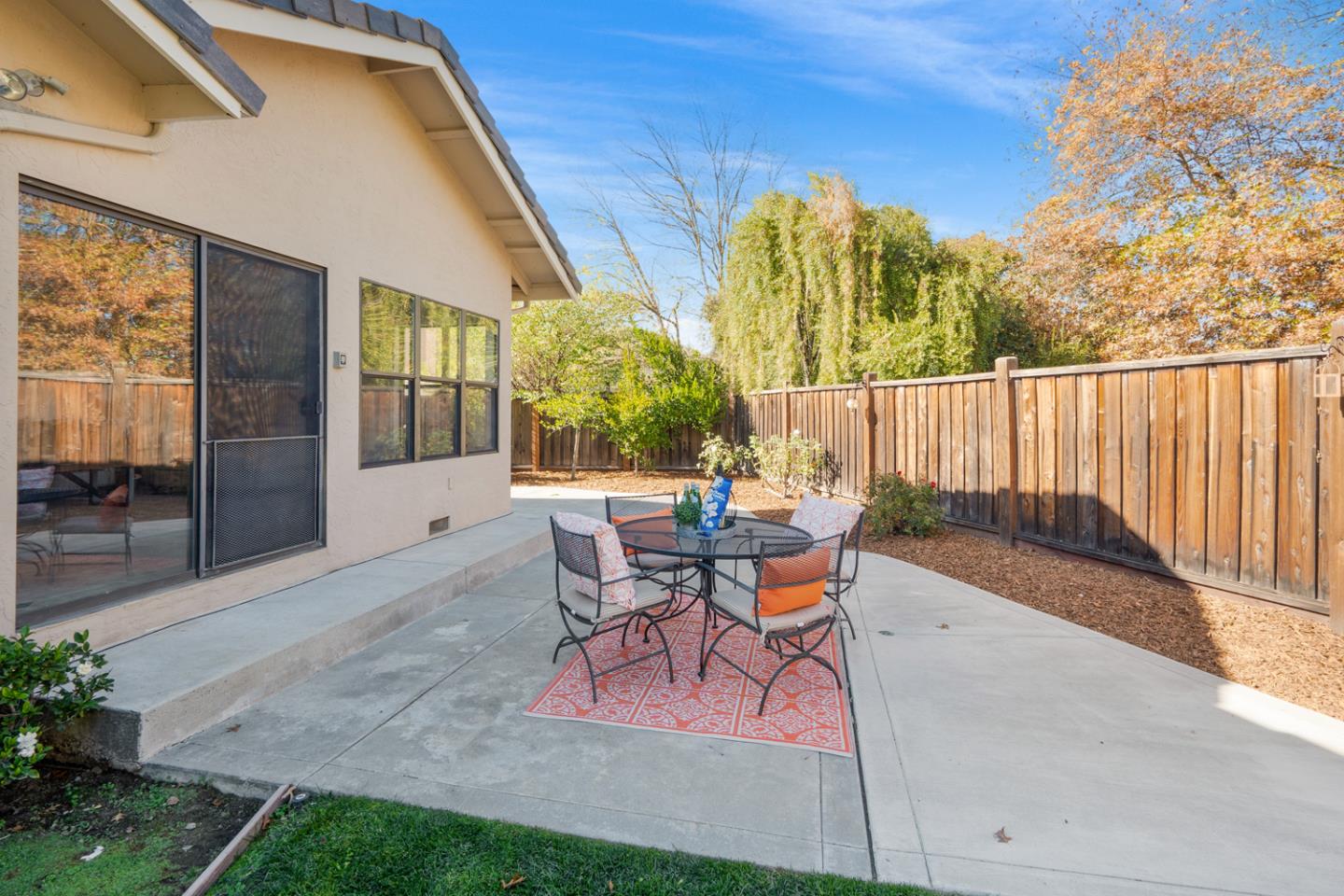 9040 Ridgeway Drive Gilroy, CA 95020 - Photo 31 of 44 a view of a house with backyard and sitting area