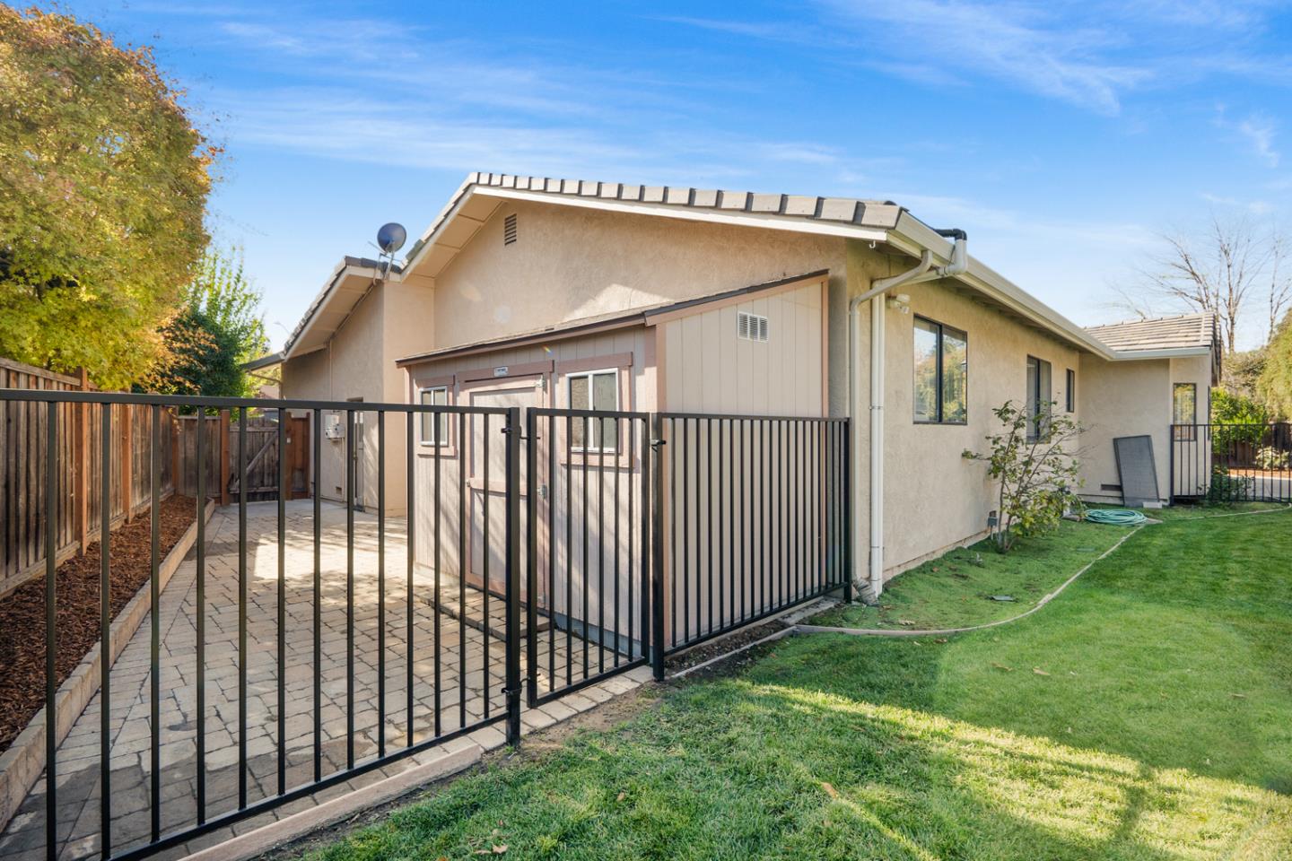 9040 Ridgeway Drive Gilroy, CA 95020 - Photo 36 of 44 a view of a house with wooden fence
