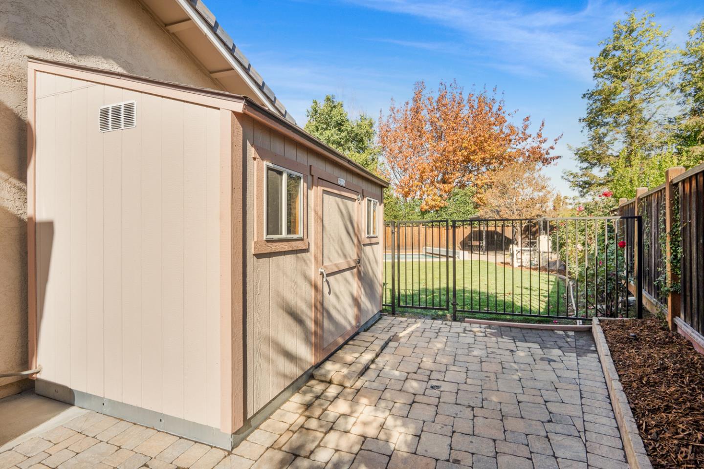 9040 Ridgeway Drive Gilroy, CA 95020 - Photo 37 of 44 a view of a house with a small yard