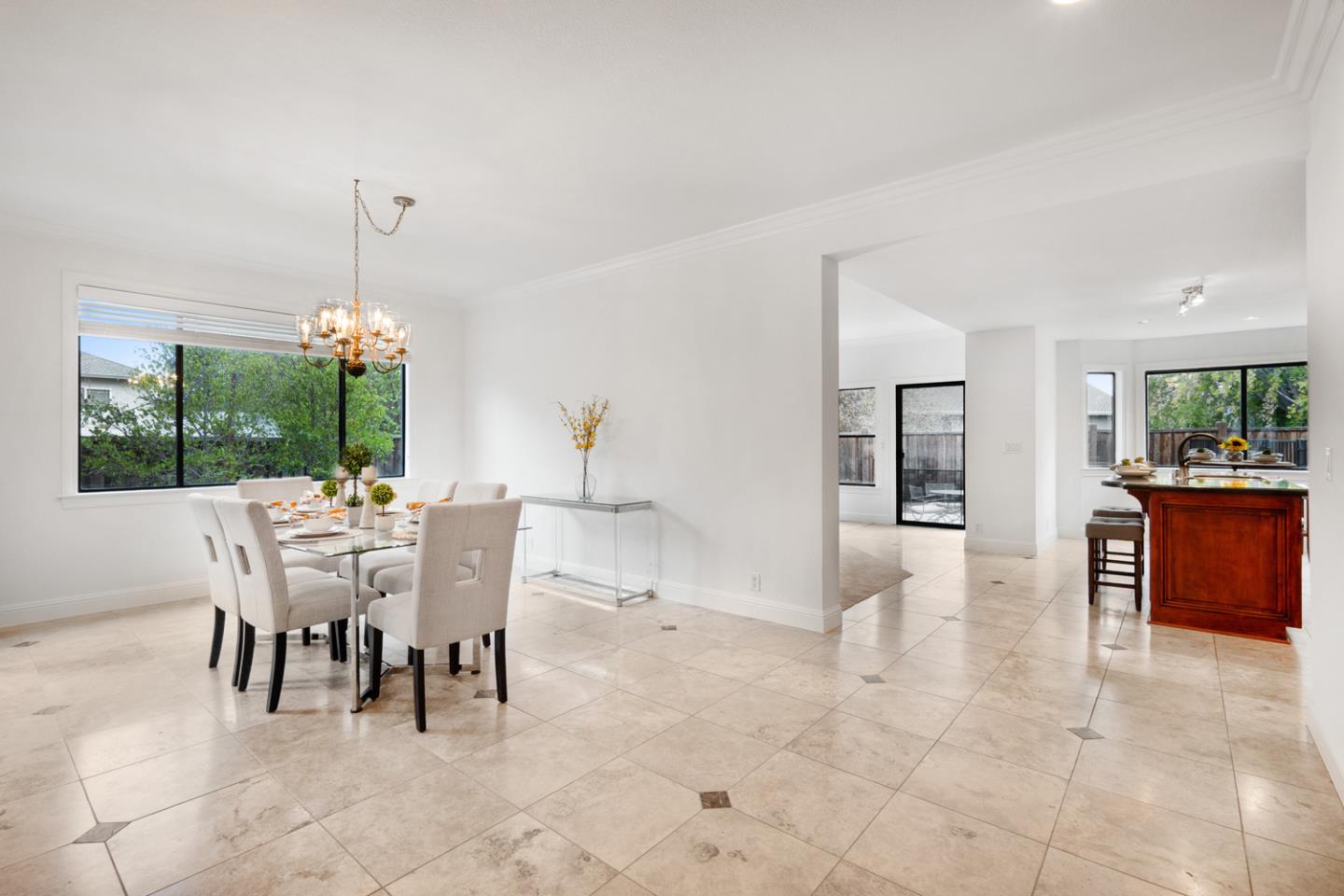 9040 Ridgeway Drive Gilroy, CA 95020 - Photo 10 of 44 a dining room with furniture window and wooden floor
