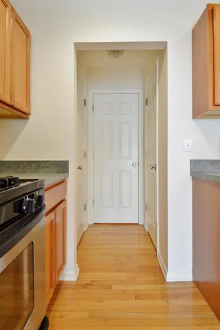 a bedroom with a bed and a stove top oven