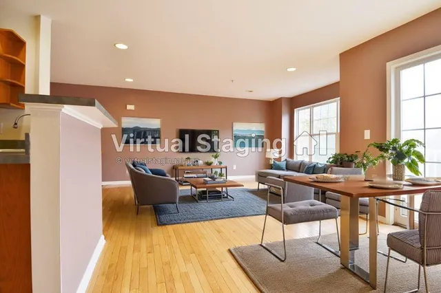 a spacious bedroom with a bed and a couch