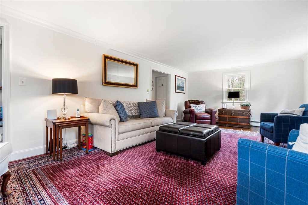 3 Wilmor Road Topsfield, MA 01983 - Photo 17 of 33 a living room with furniture and a wooden floor