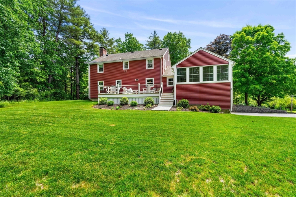 3 Wilmor Road Topsfield, MA 01983 - Photo 29 of 33 a front view of house with yard and green space