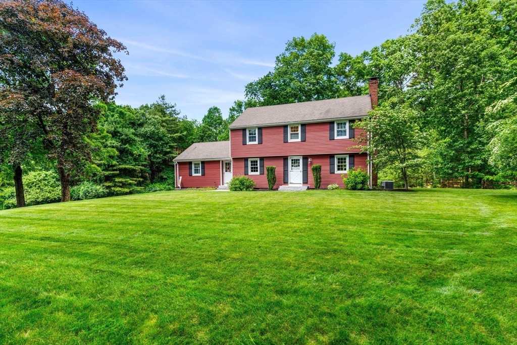 3 Wilmor Road Topsfield, MA 01983 - Photo 33 of 33 a front view of a house with a yard