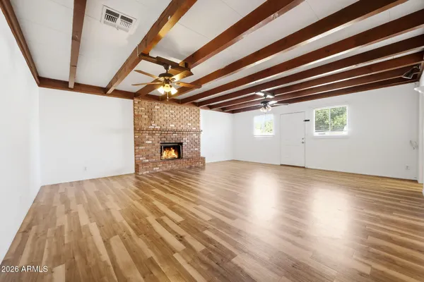 a view of room and wooden floor