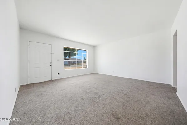 an empty room with windows