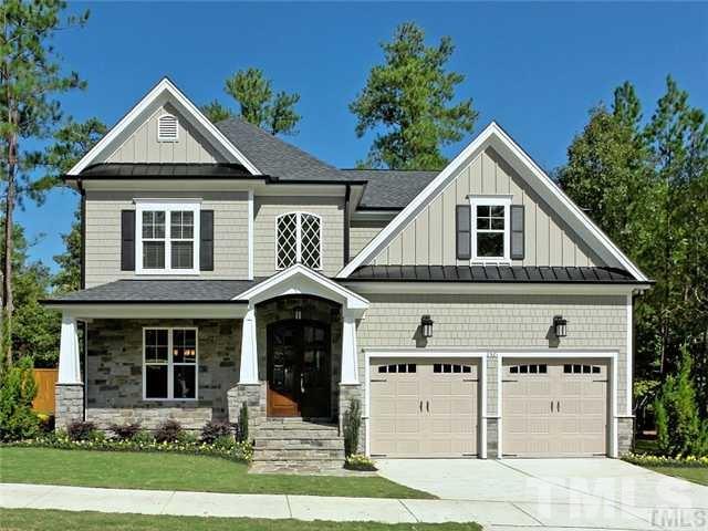 5527 Alpine Drive Raleigh, NC 27609 - Photo 14 of 15 a front view of a house with a yard