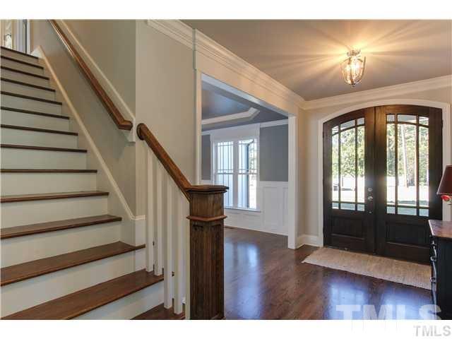 5527 Alpine Drive Raleigh, NC 27609 - Photo 1 of 15 a view of entryway with wooden floor