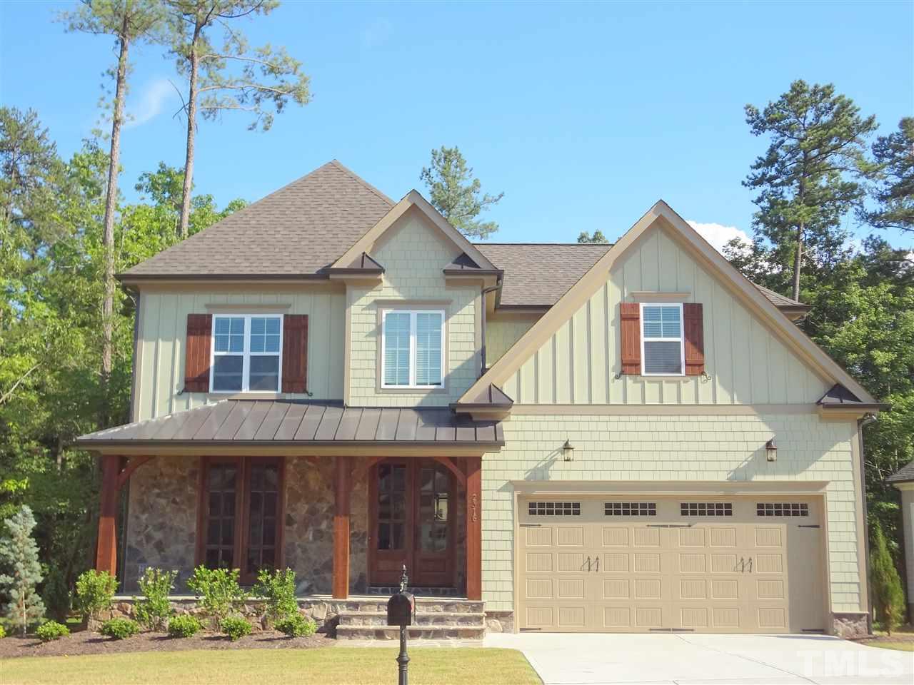 5527 Alpine Drive Raleigh, NC 27609 - Photo 2 of 15 a front view of a house with a yard