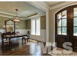 5527 Alpine Drive Raleigh, NC 27609 - Photo 4 of 15 a view of a dining room with furniture window and wooden floor