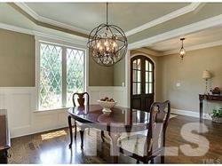 5527 Alpine Drive Raleigh, NC 27609 - Photo 6 of 15 a view of a dining room with furniture window and wooden floor