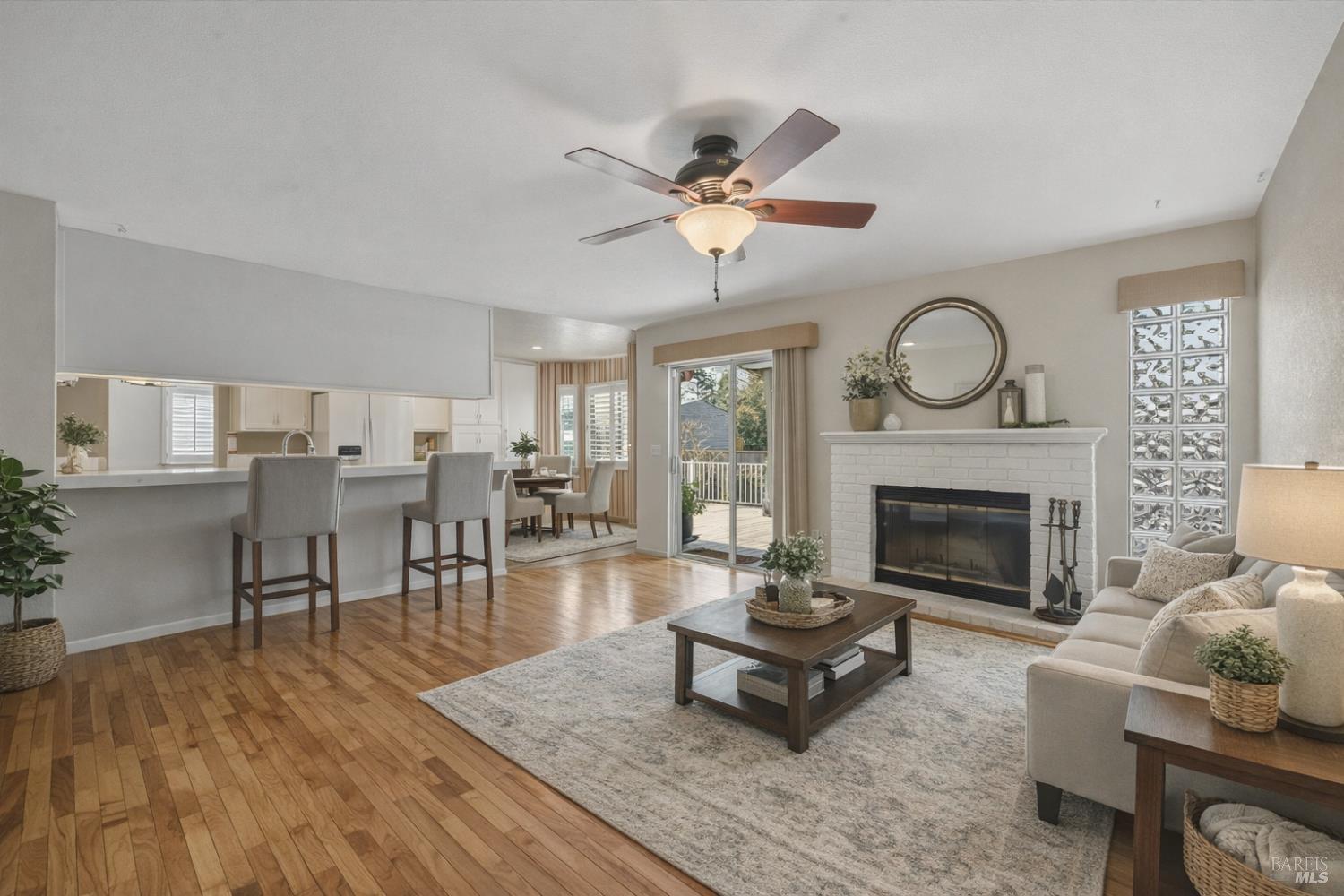 8873 Lebec Lane Cotati, CA 94931 - Photo 15 of 49 Spacious family room with bar, gas starter wood fireplace. (virtually staged)