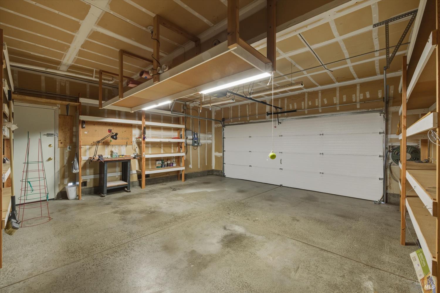 8873 Lebec Lane Cotati, CA 94931 - Photo 46 of 56 Two car garage with plenty of storage shelving and electrical outlets.