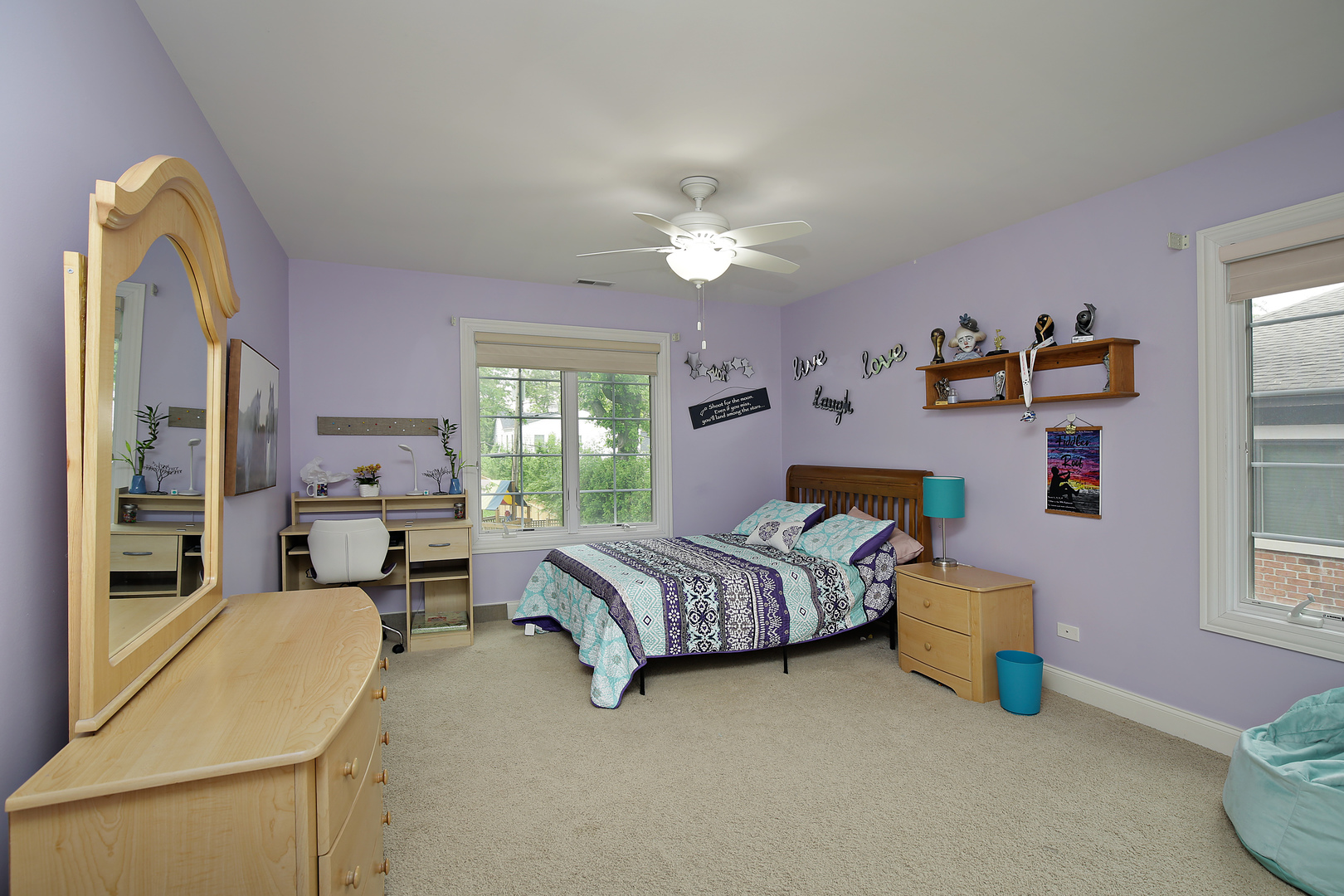 1528 Stratford Road Deerfield, IL 60015 - Photo 14 of 25 a bedroom with furniture and a chandelier