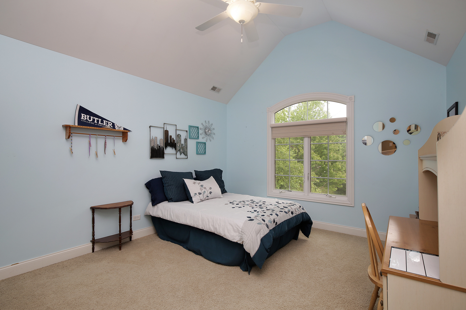 1528 Stratford Road Deerfield, IL 60015 - Photo 15 of 25 a bedroom with a bed and a chandelier