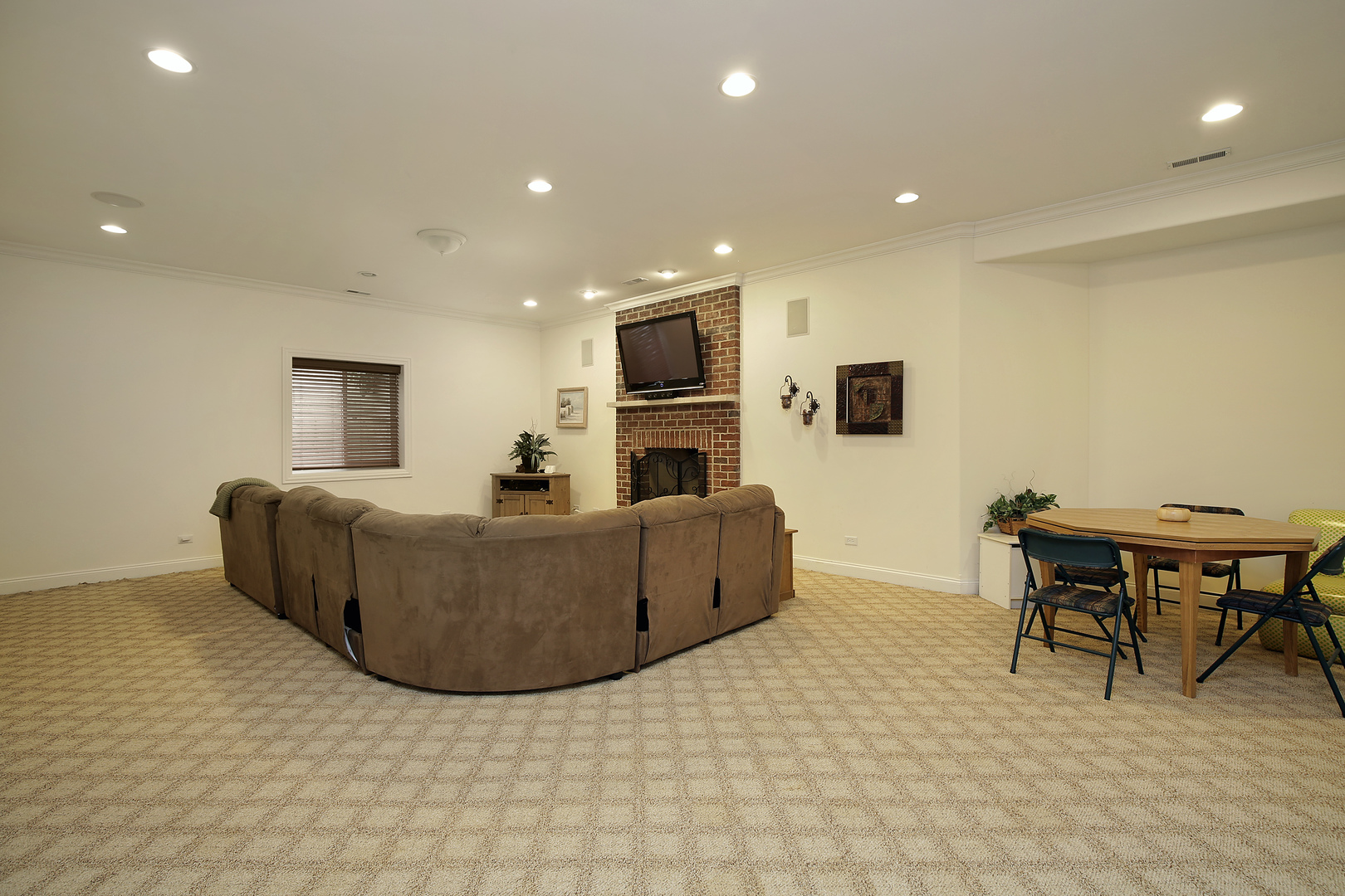 1528 Stratford Road Deerfield, IL 60015 - Photo 18 of 25 a living room with furniture and a flat screen tv