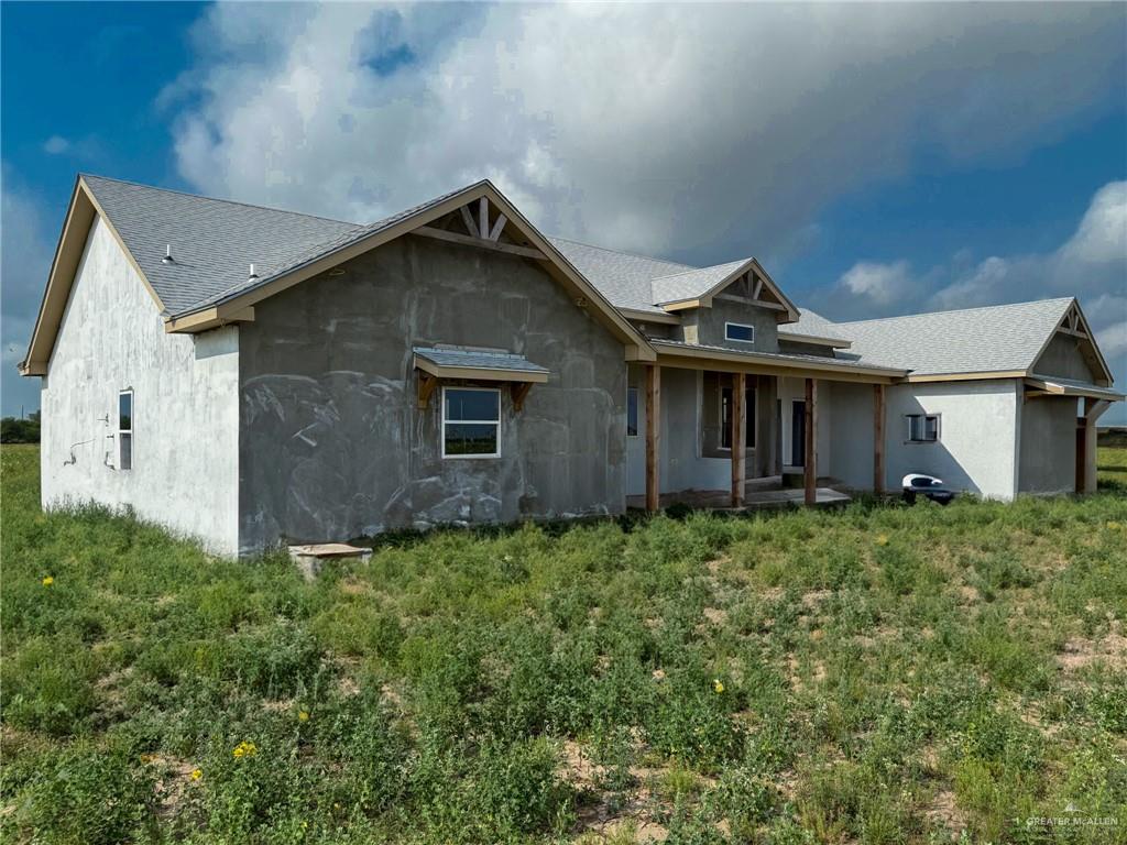 0 Brushline Road Edcouch, TX 78538 - Photo 10 of 17 a front view of a house with plants
