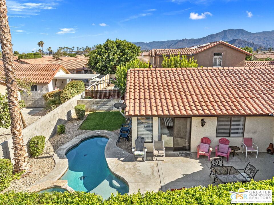 45688 Sutter Creek Road Indio, CA 92201 - Photo 48 of 51 a front view of a house with a garden