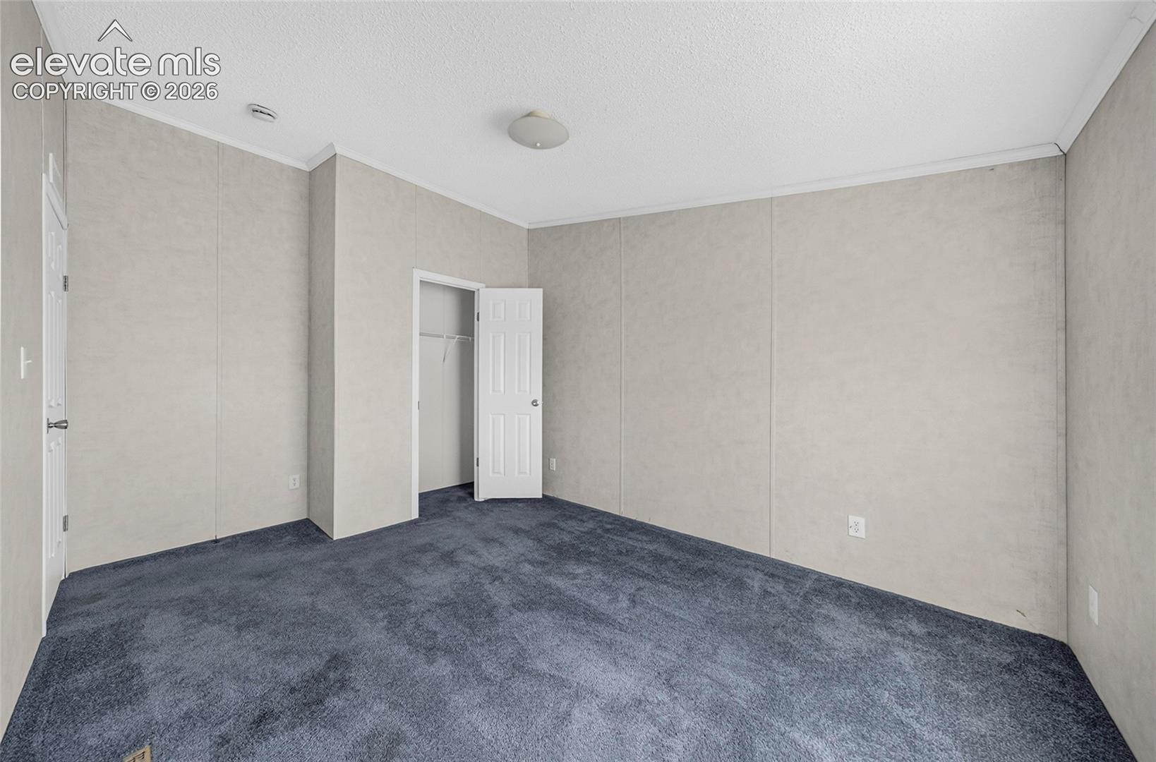 41751 Harbour Road Avondale, CO 81022 - Photo 13 of 41 Carpeted flooring and a built-in closet