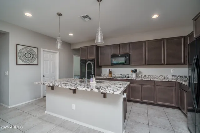 a picture of a bench in front of a wall