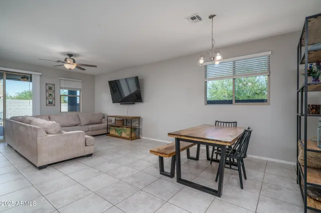 a room with furniture and a book shelf