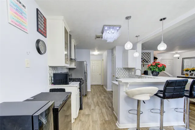 a view of a house with a backyard and a slide