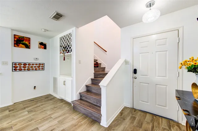 a kitchen with a table and chairs in it