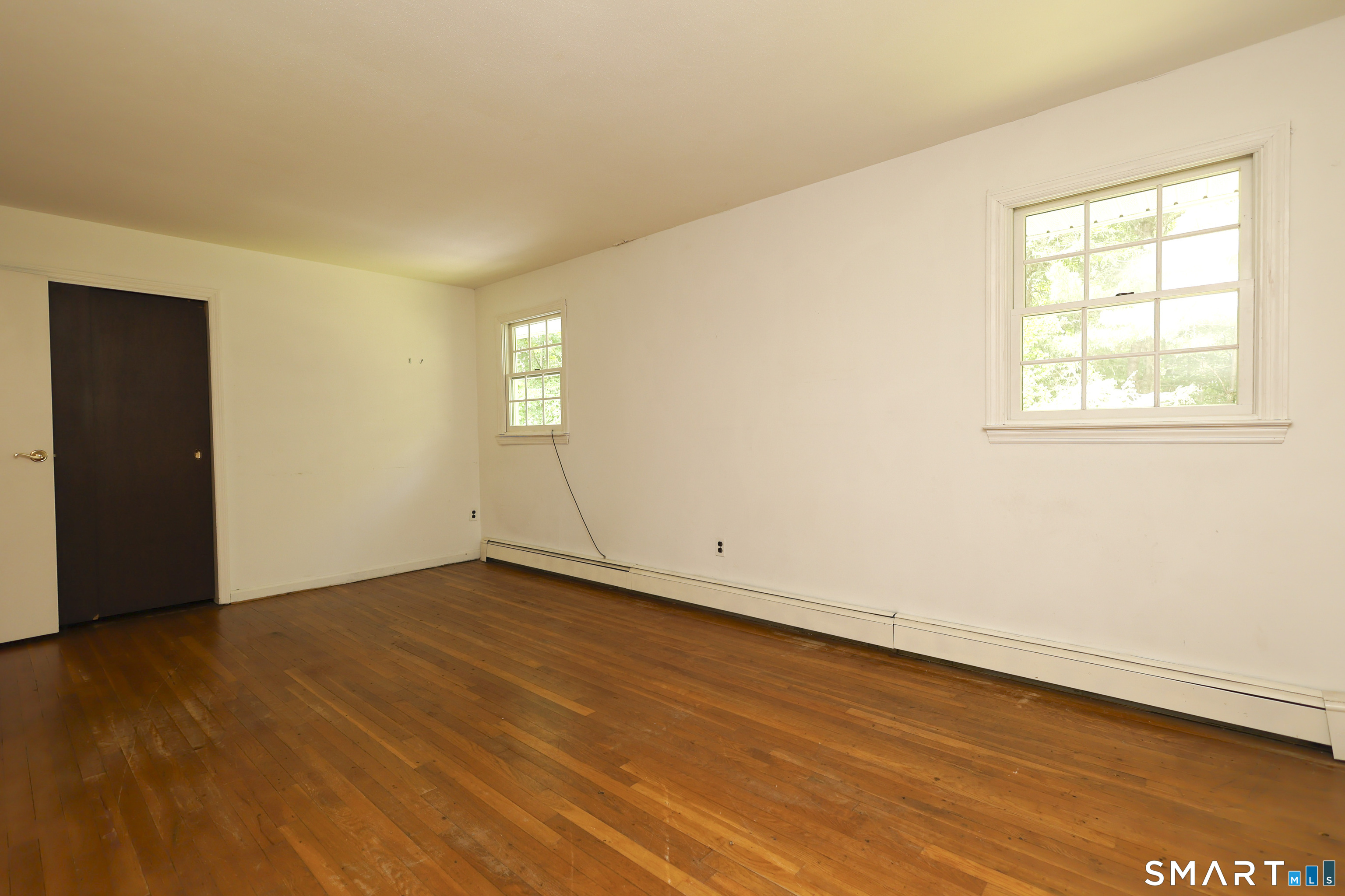 145 Wilton Road East Ridgefield, CT 06877 - Photo 28 of 37 Bedroom #4 also has hardwood floors.