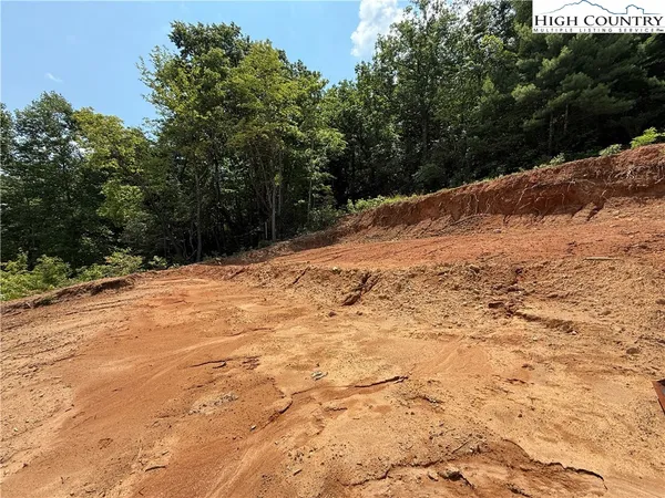 a view of a backyard of a house
