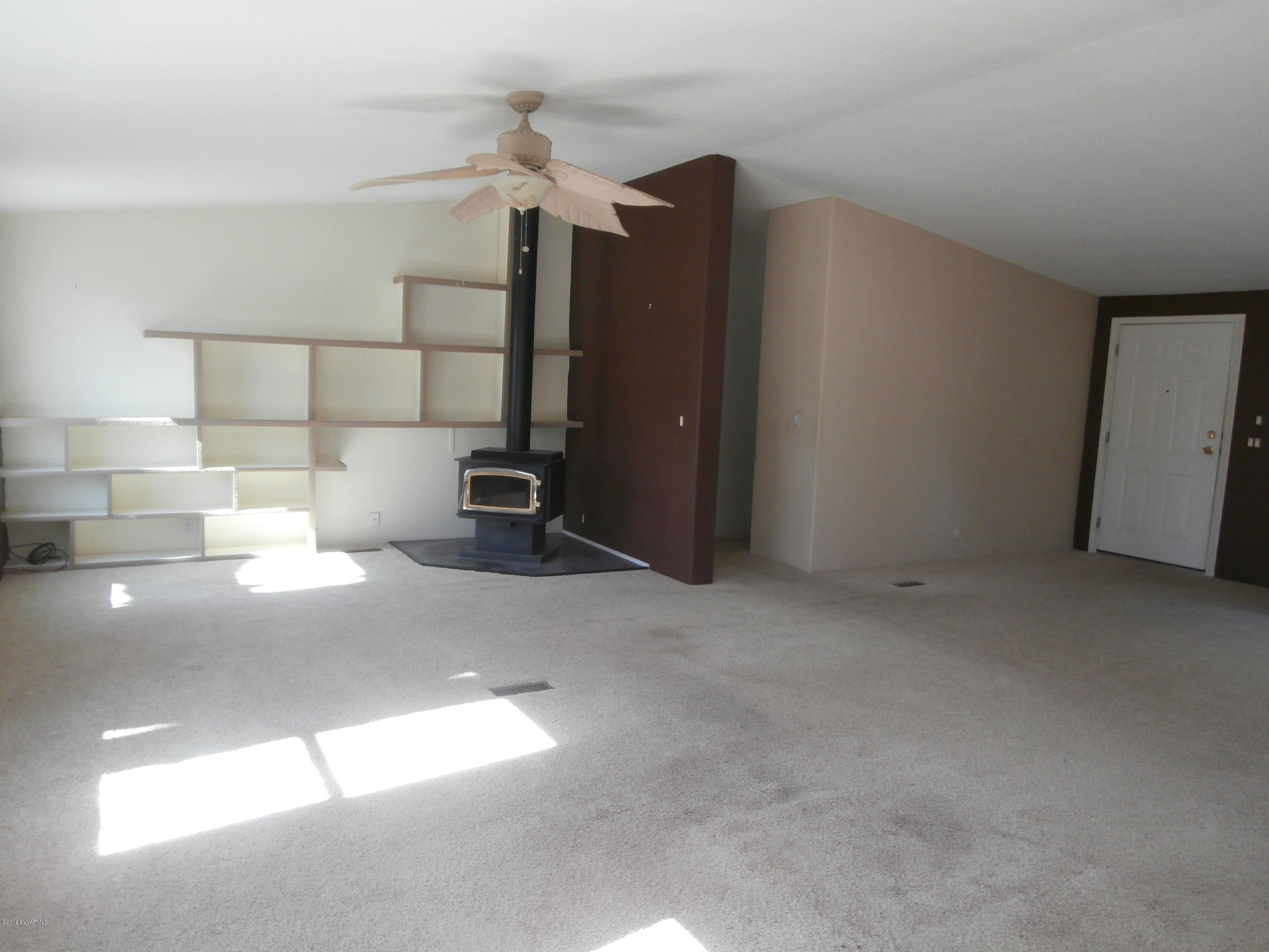 4305 East Aztec Road Rimrock, AZ 86335 - Photo 15 of 25 a view of a livingroom with furniture and window