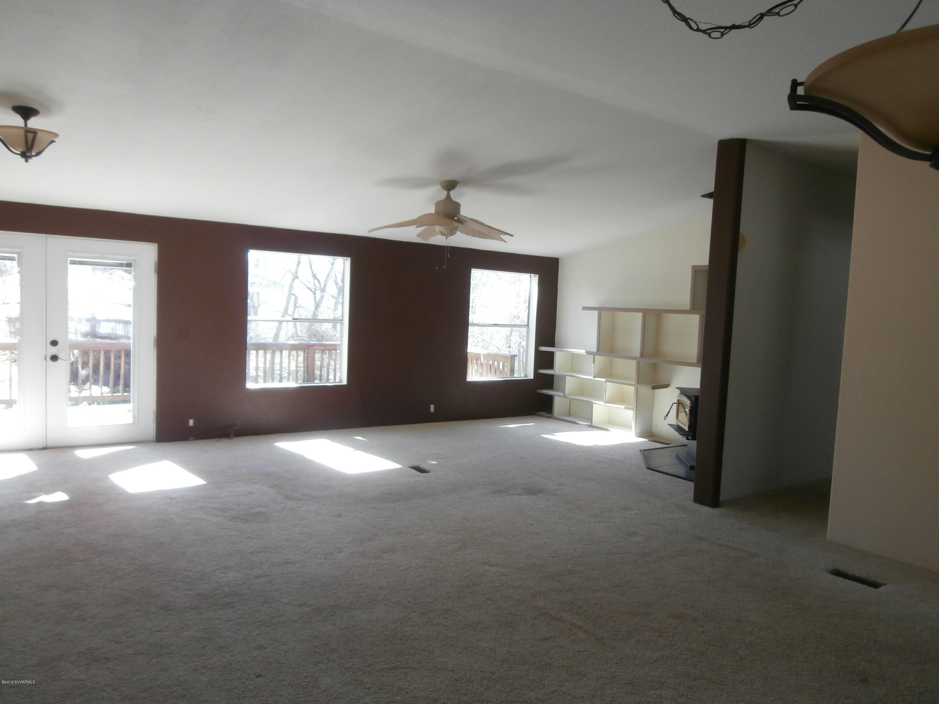 4305 East Aztec Road Rimrock, AZ 86335 - Photo 16 of 25 an empty room with windows and entrance