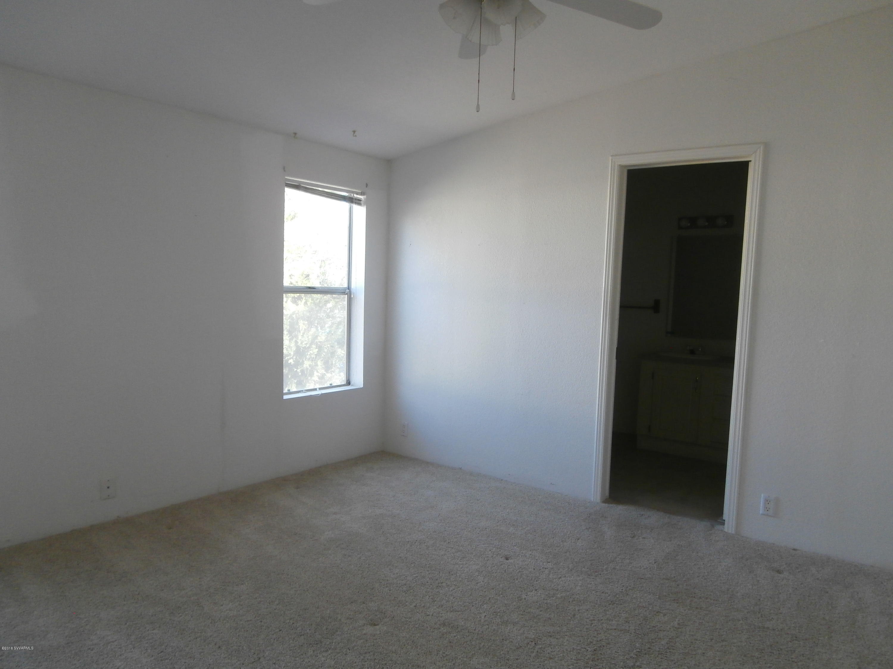 4305 East Aztec Road Rimrock, AZ 86335 - Photo 21 of 25 an empty room with a window