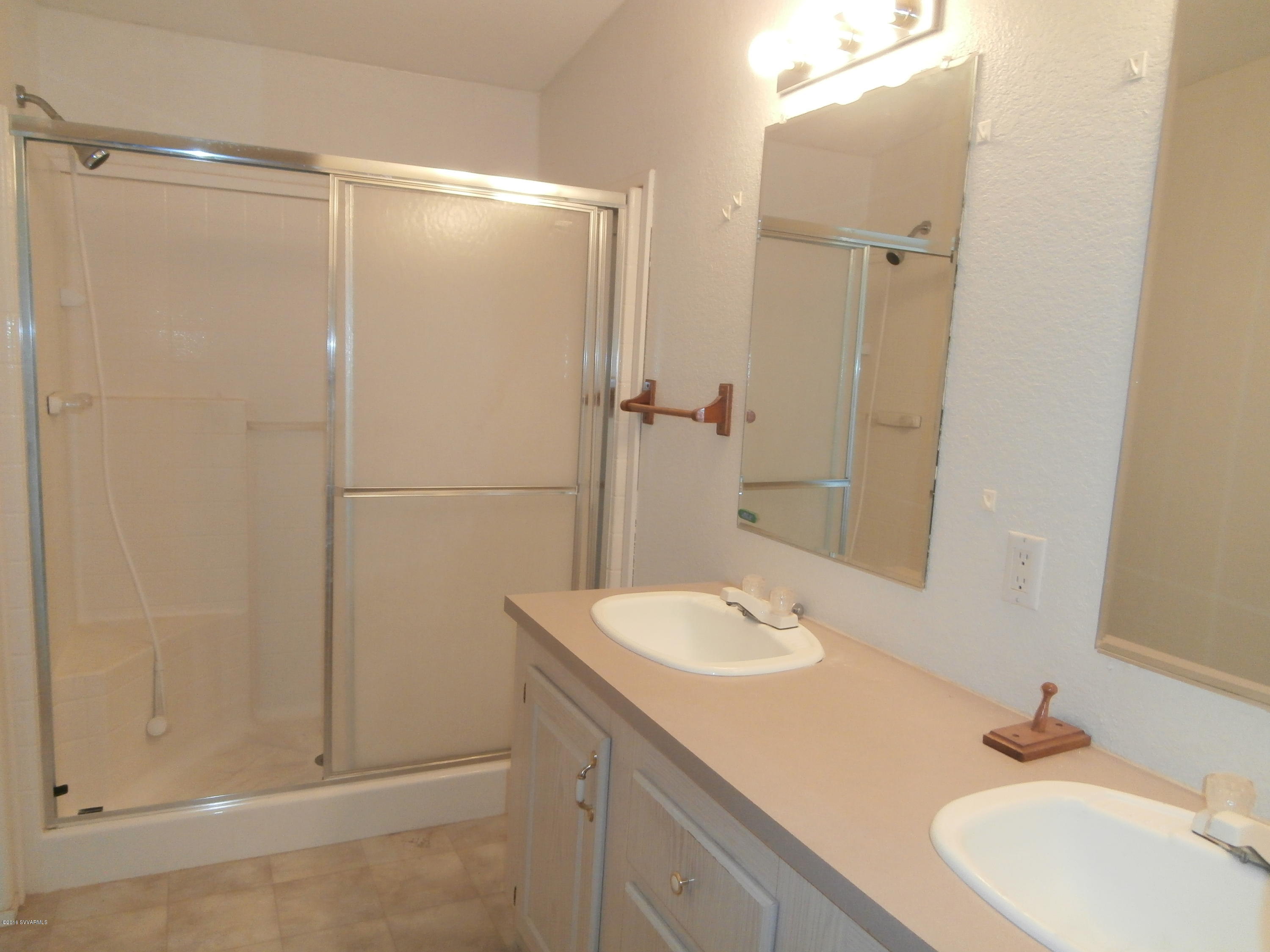 4305 East Aztec Road Rimrock, AZ 86335 - Photo 24 of 25 a bathroom with a sink and a mirror