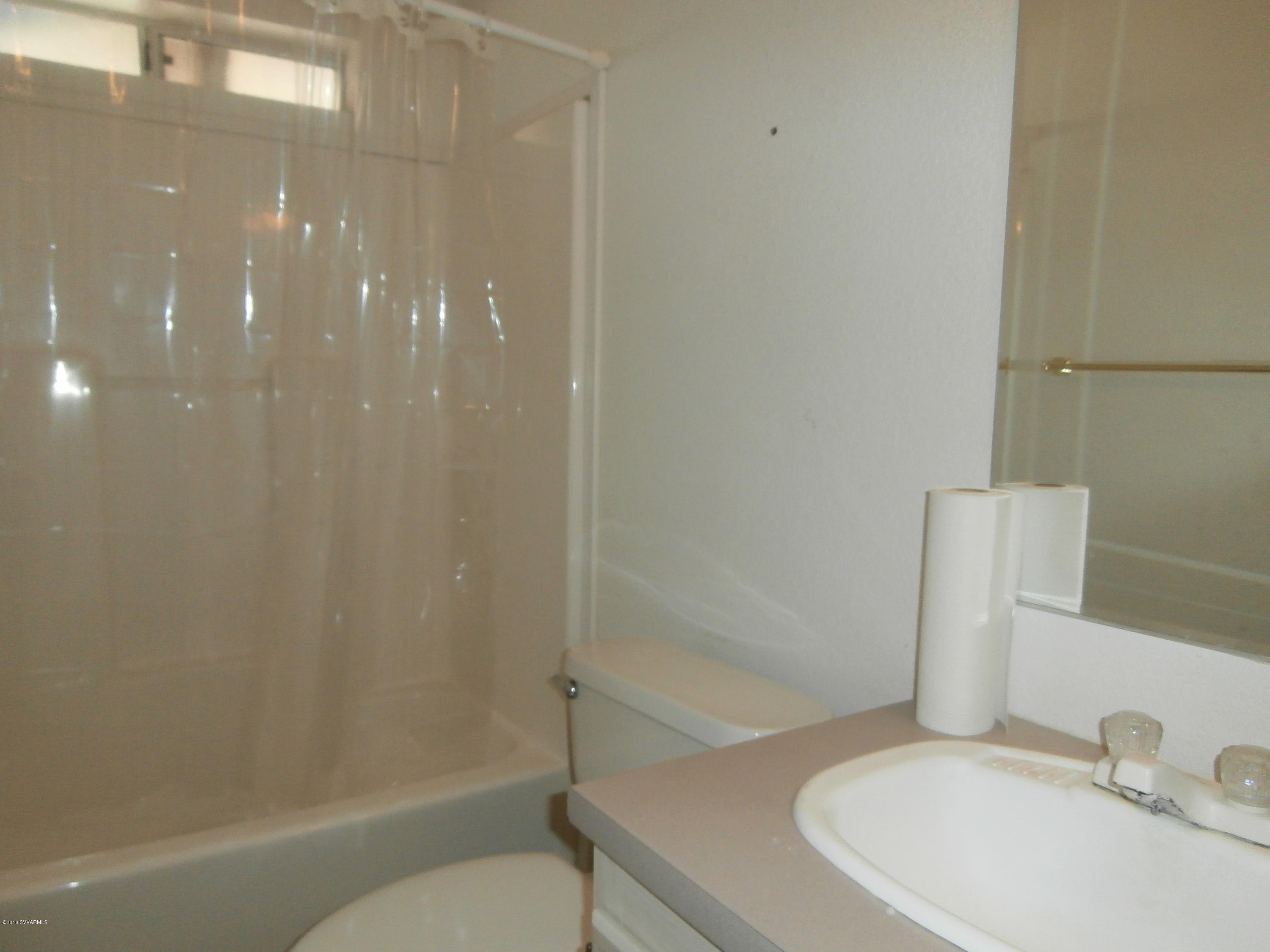 4305 East Aztec Road Rimrock, AZ 86335 - Photo 25 of 25 a bathroom with a sink and a mirror