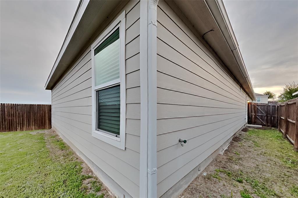 5529 McClelland Street Forney, TX 75126 - Photo 14 of 16 a view of a backyard