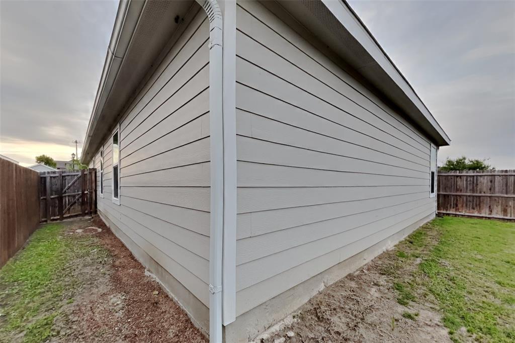 5529 McClelland Street Forney, TX 75126 - Photo 15 of 16 a view of a backyard