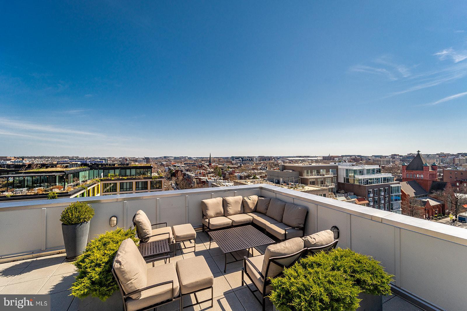 1401 R Street Northwest, Unit 406 Washington, DC 20009 - Photo 17 of 22 a view of a terrace with furniture