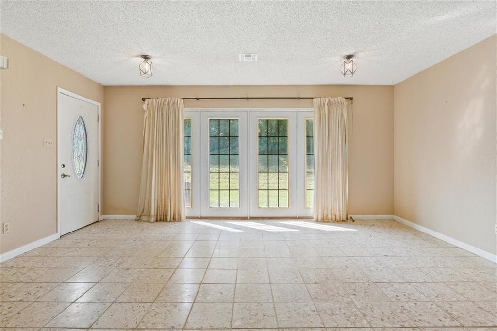 1487 Middleton Road Mart, TX 76664 - Photo 13 of 40 a view of an empty room with a window