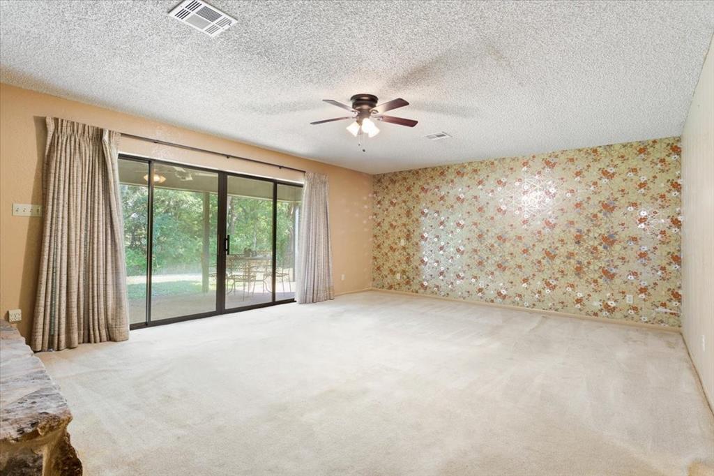 1487 Middleton Road Mart, TX 76664 - Photo 24 of 40 a view of a livingroom with a ceiling fan and window